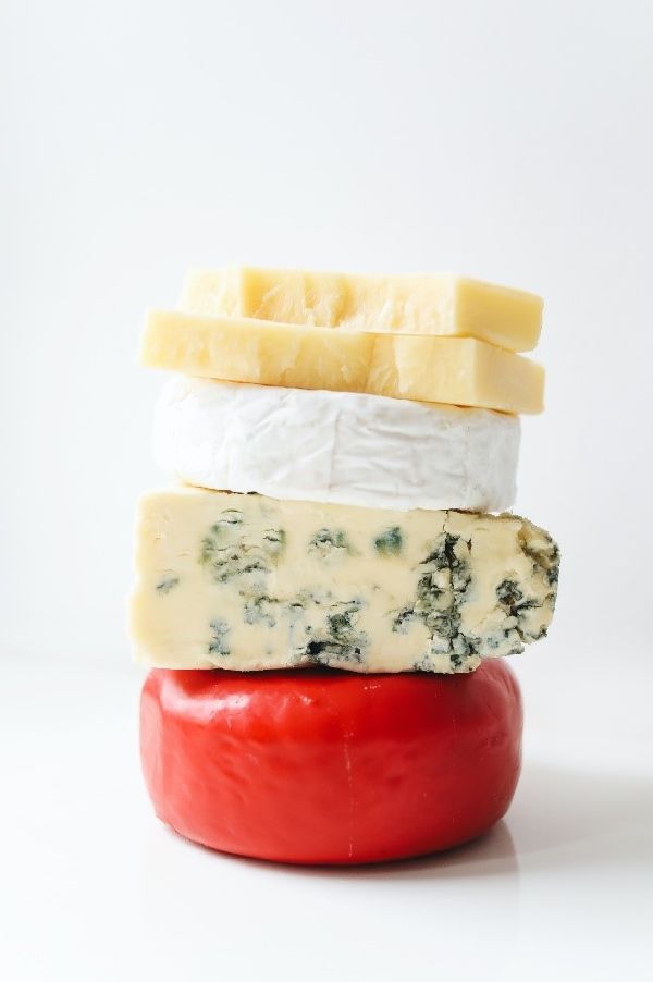 stack of different types of cheese
