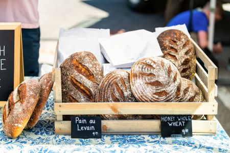 Loaves of bread displayed on a market table