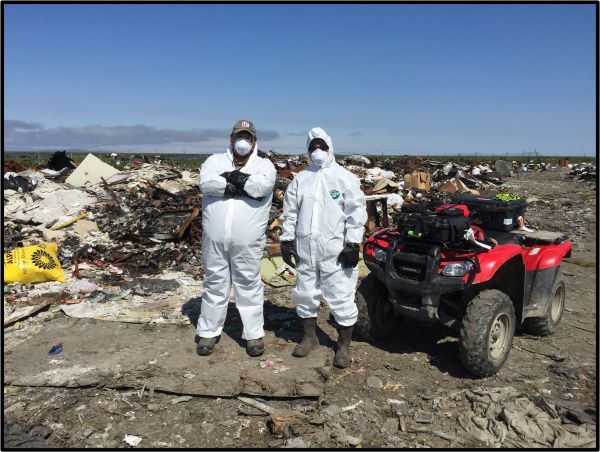 Landfill Operators Wearing PPE